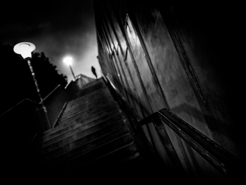 Silhouette on Stairs — Black, Dramatic