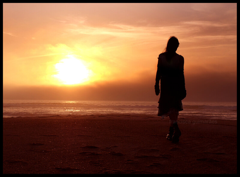 Silhouette on the beach at sunset