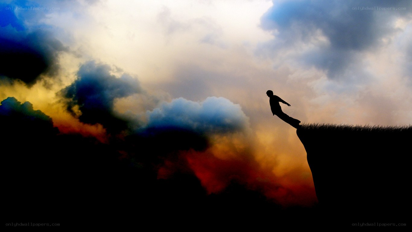 Silhouette on the cliff edge