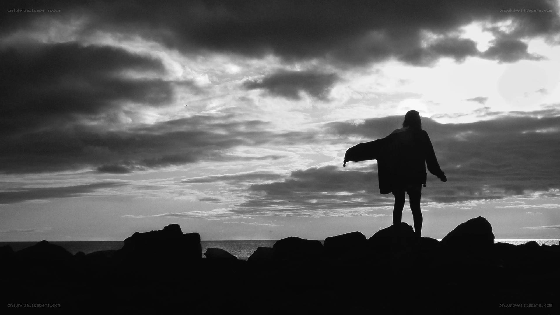 Silhouette on the shore