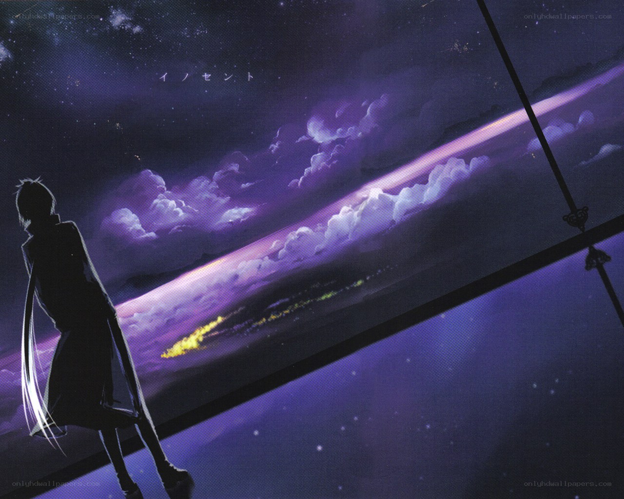 silhouette overlooking purple sky