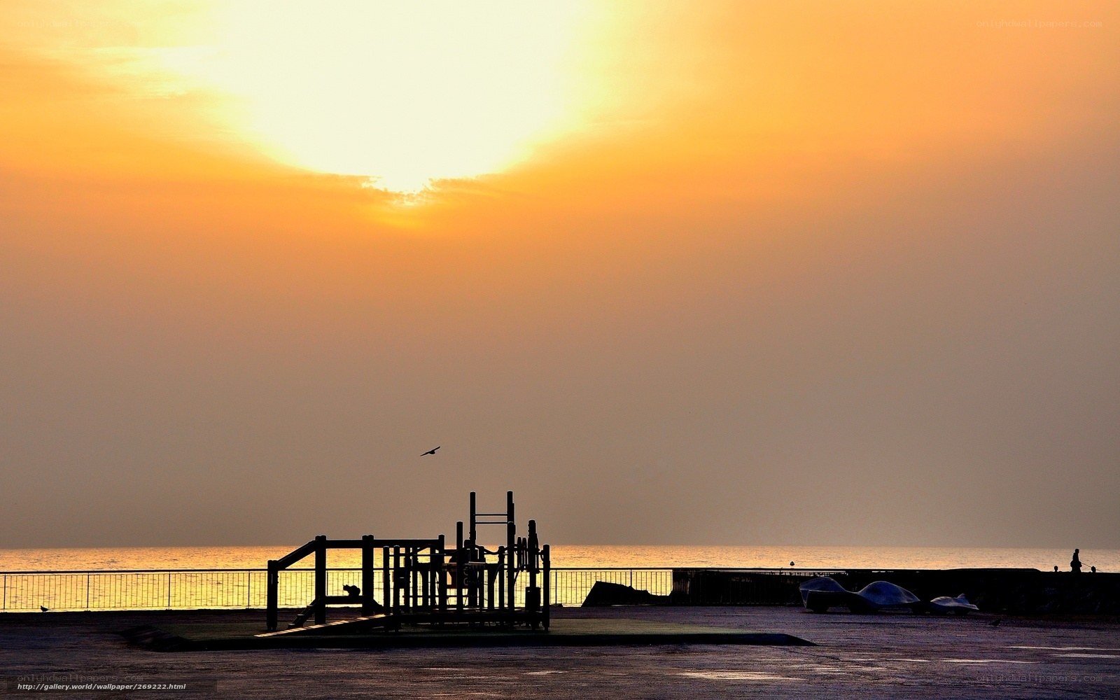 Silhouette playground at sunset