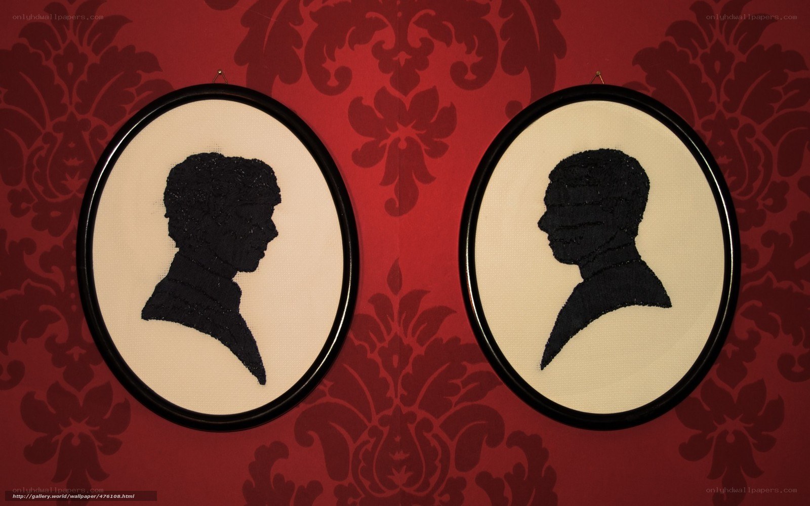Silhouette portraits on red wallpaper