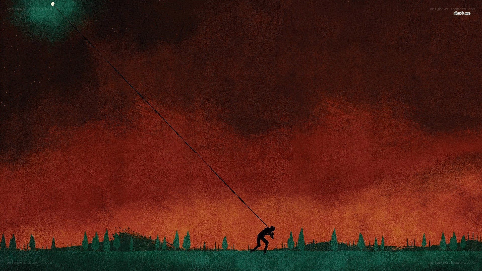 Silhouette pulling rope at sunset