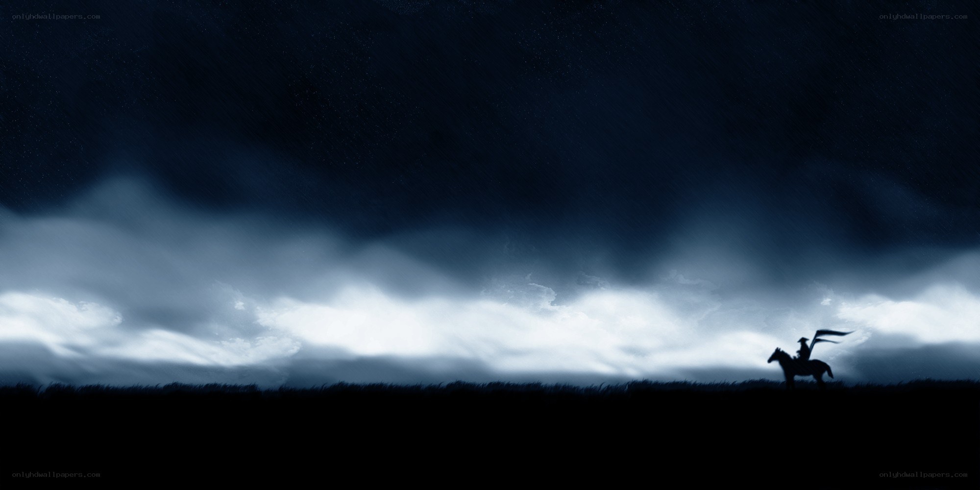 Silhouette rider on stormy night