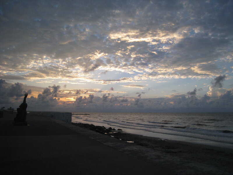 Silhouette Statue on Beach