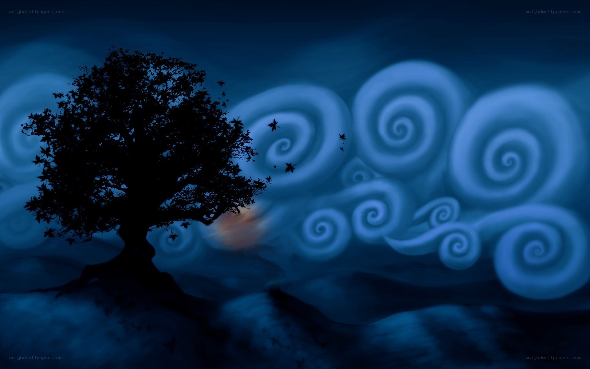 Silhouette tree under swirling sky