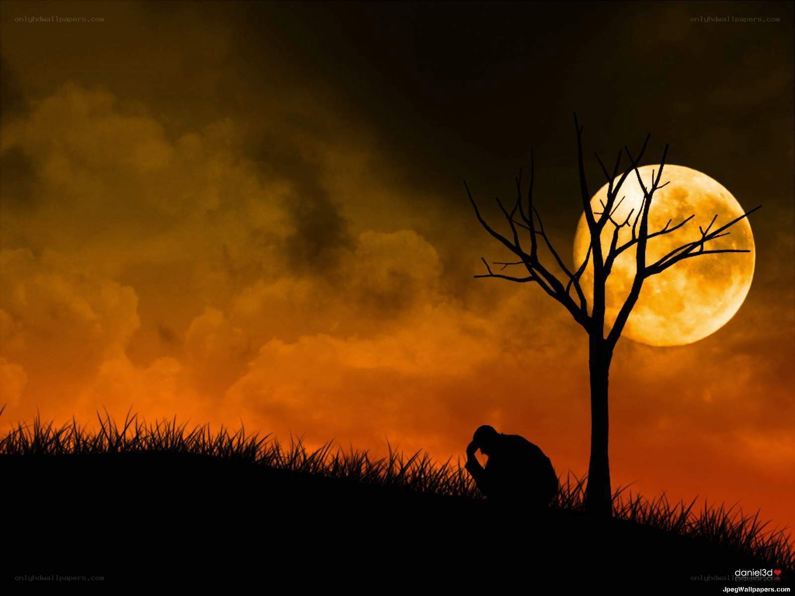 Silhouette under a full moon