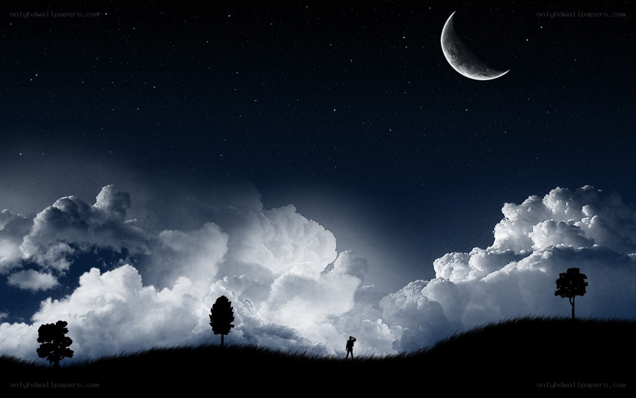 Silhouette under crescent moon