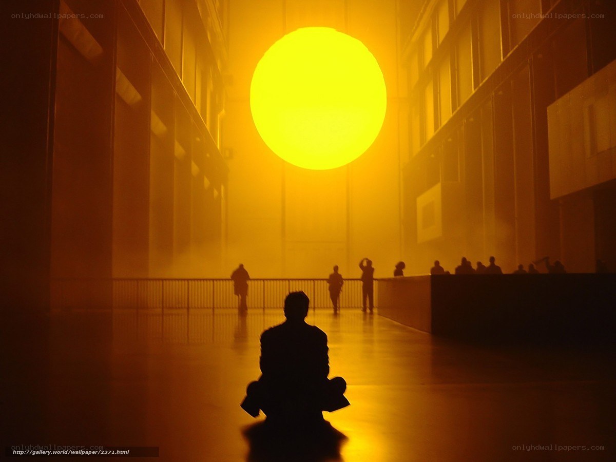 Silhouette under giant sun