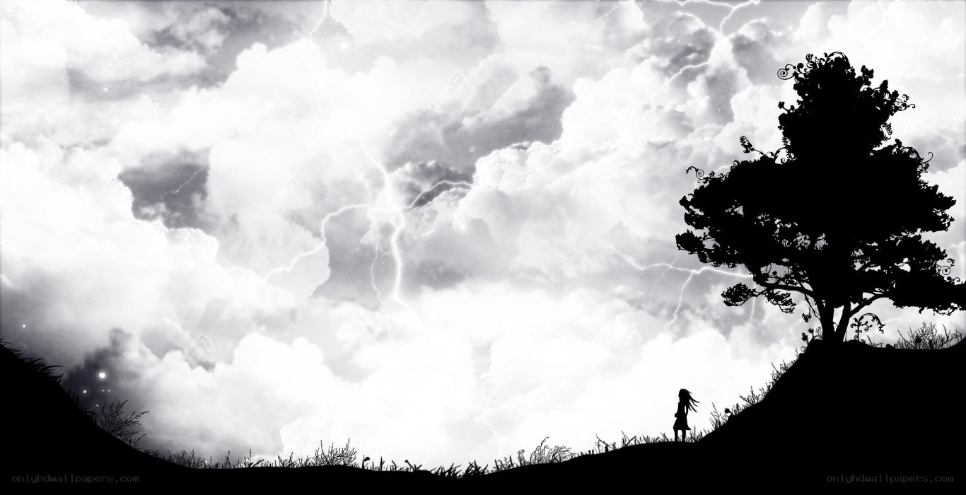 Silhouette under stormy sky
