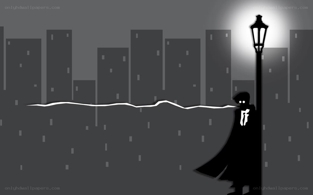 silhouette under streetlight