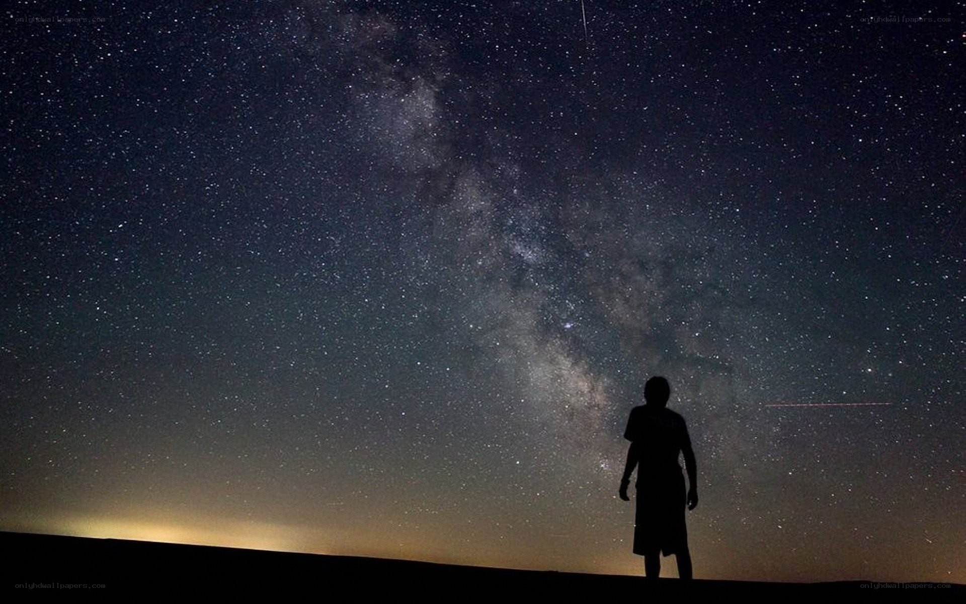 Silhouette under the Milky Way