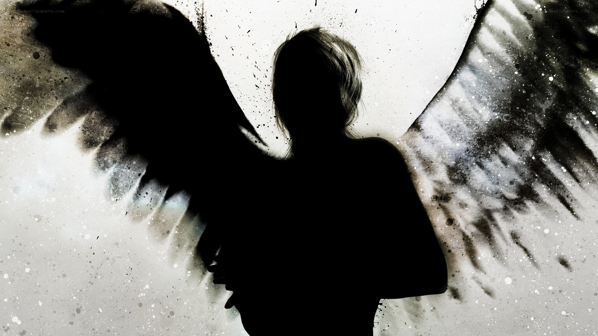 silhouette with angel wings