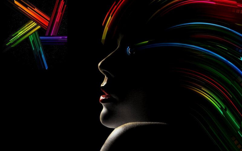 silhouette with colorful light trails