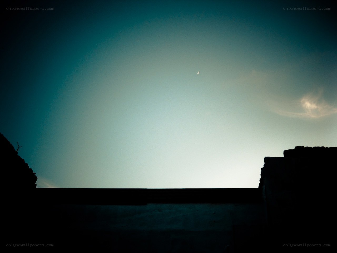 Silhouette with crescent moon