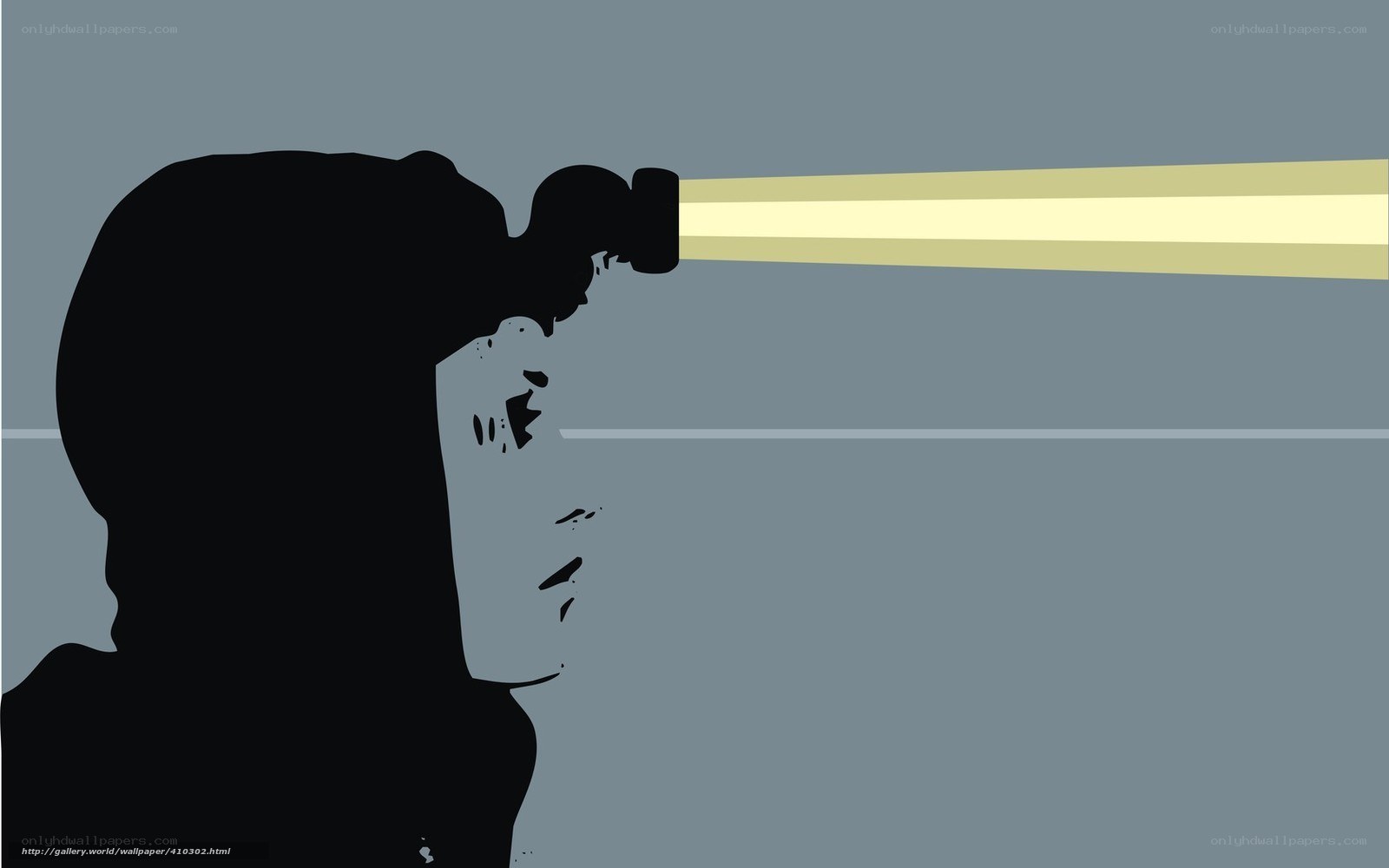 silhouette with flashlight beam