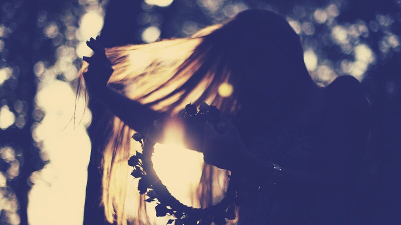 silhouette with floral wreath