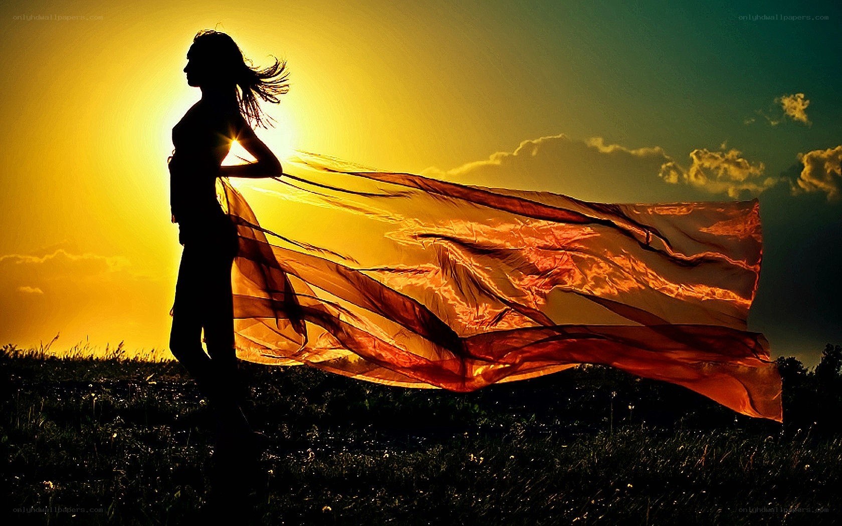 silhouette with flowing scarf