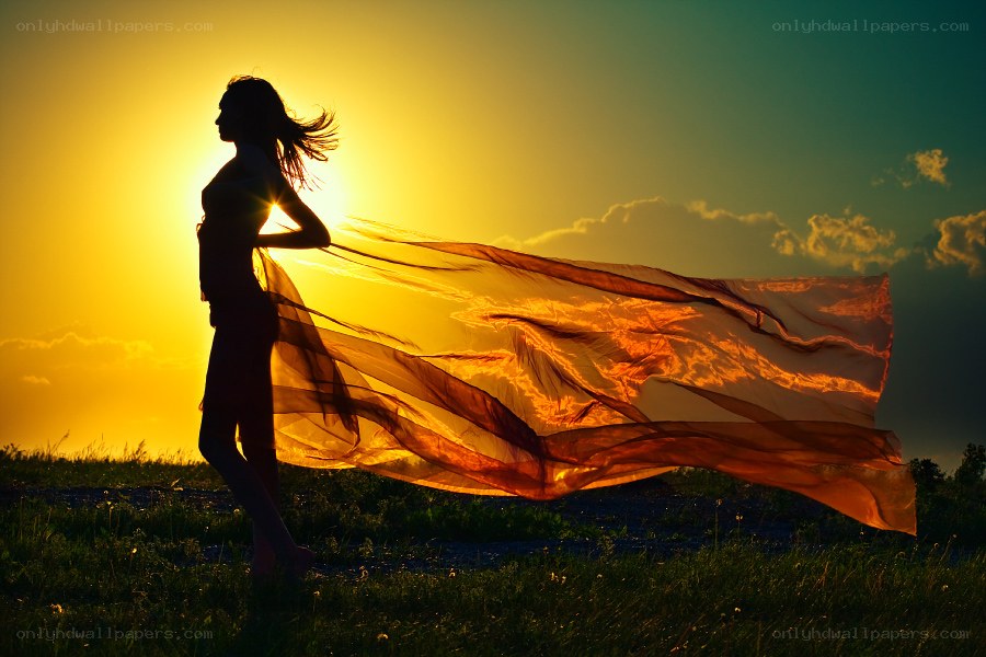 Silhouette with flowing scarf