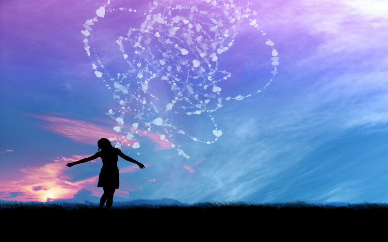 Silhouette with heart particles