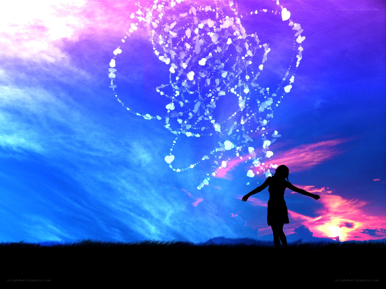 Silhouette with heart particles
