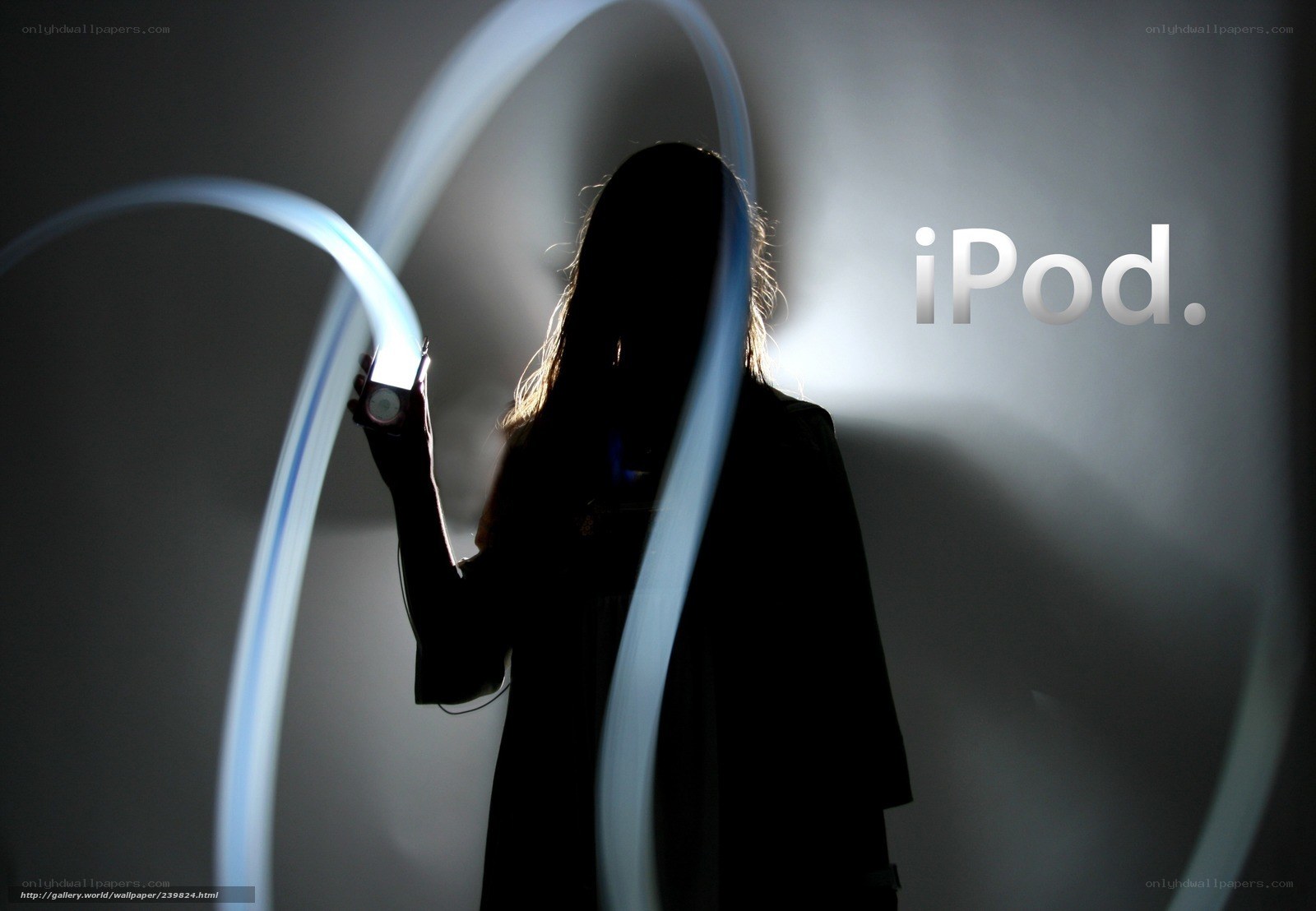 Silhouette with iPod and light trails