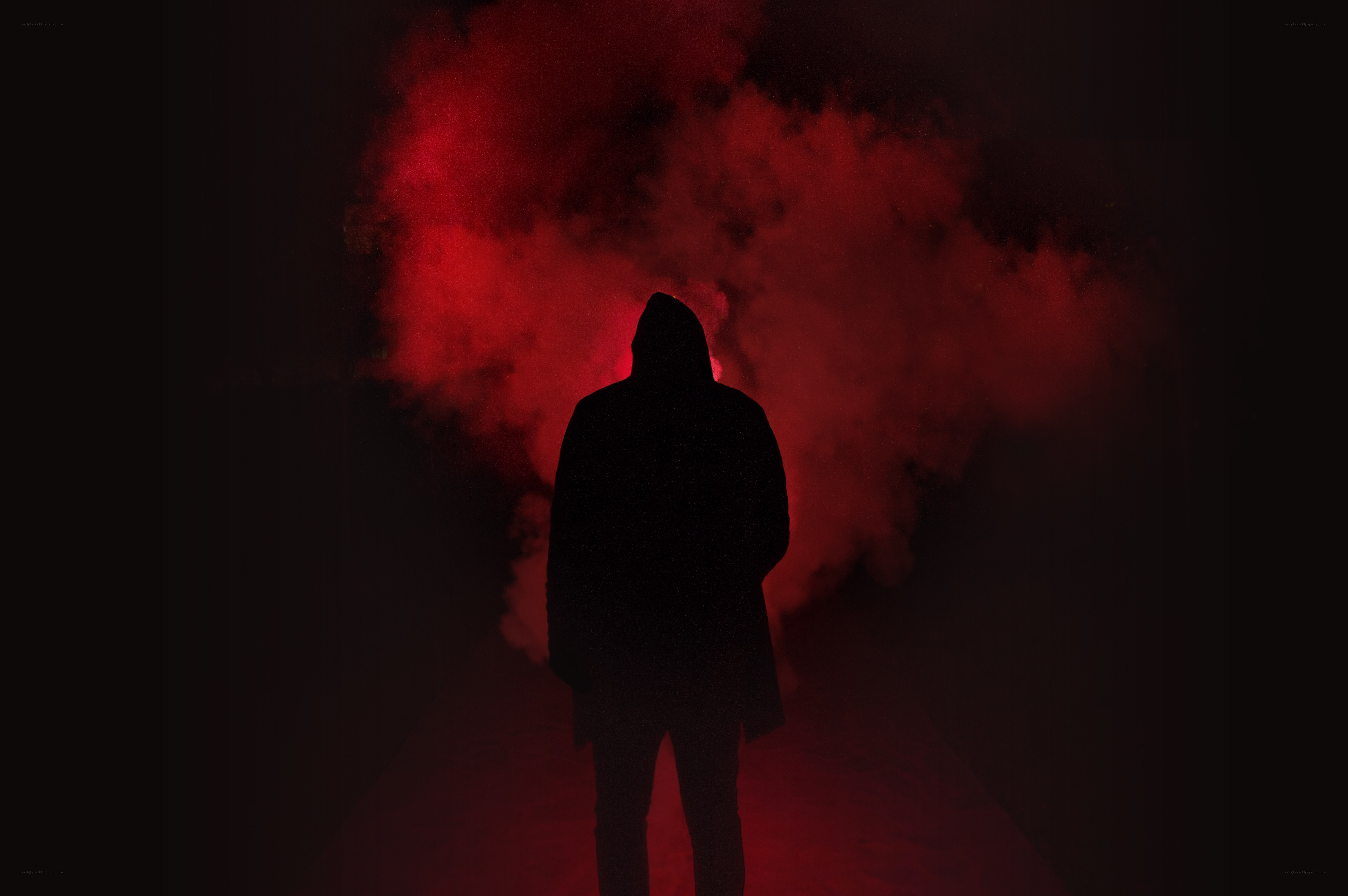 silhouette with red smoke