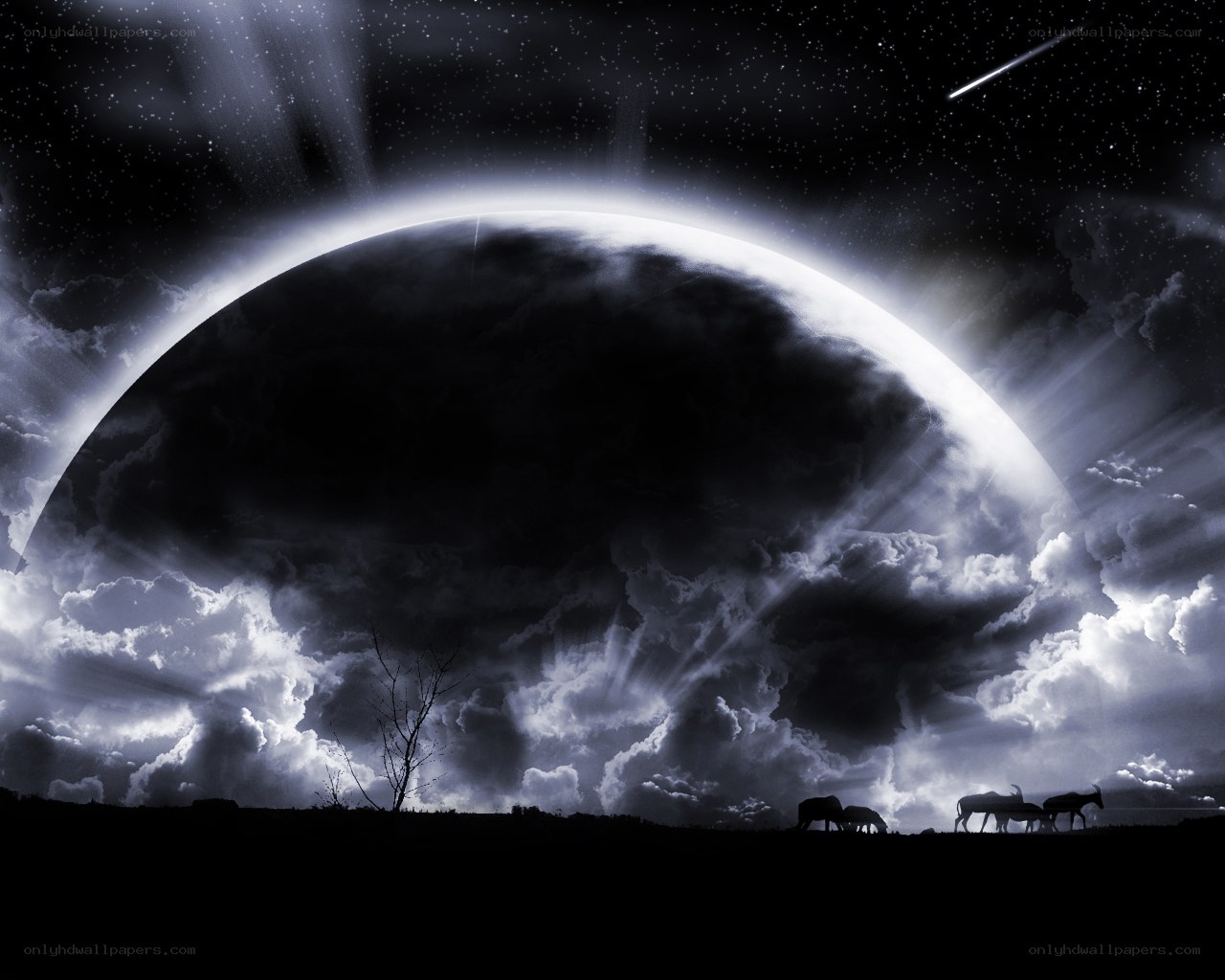 Silhouetted animals under a giant planet