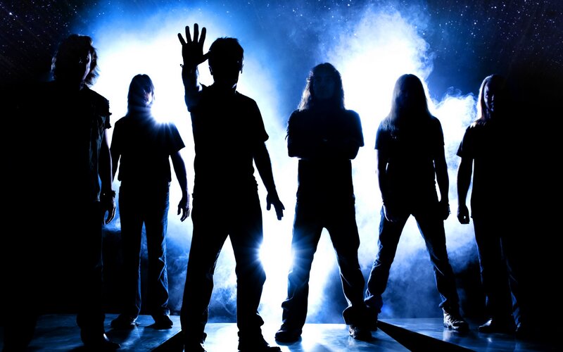 Silhouetted Band on Stage — Blue