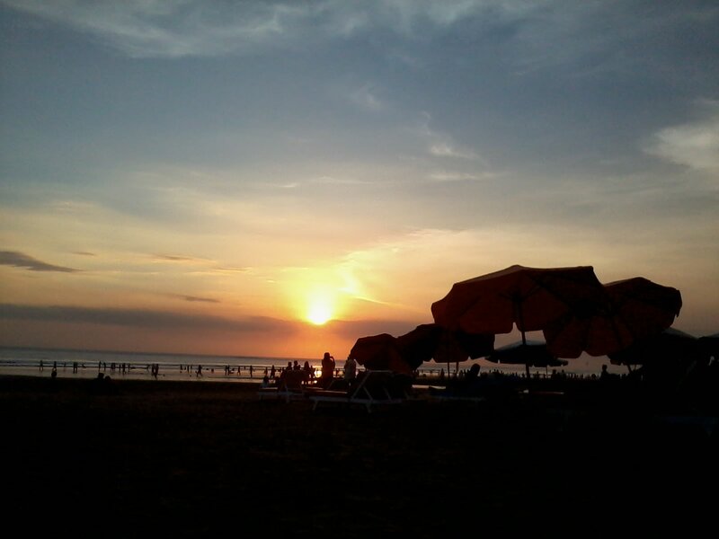Silhouetted Beach Umbrellas — Orange