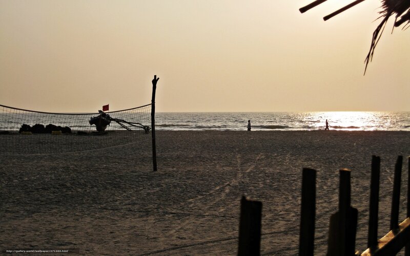 Silhouetted Beach Volleyball Net