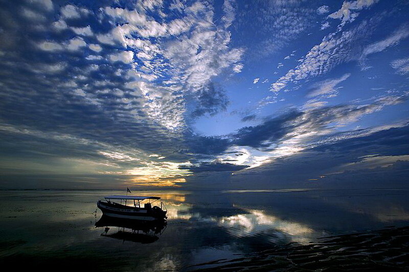 Silhouetted Boat on Water