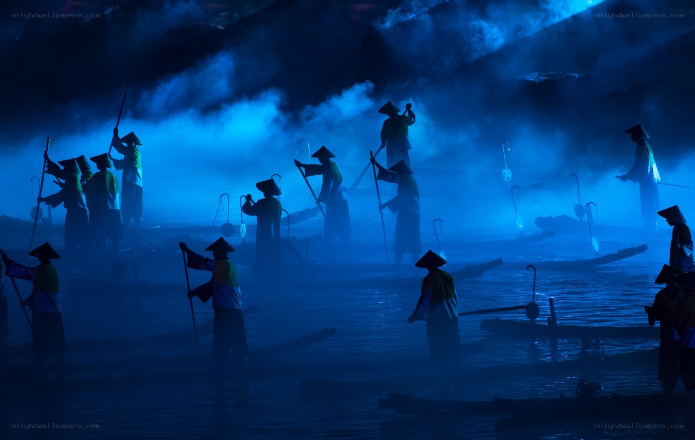 Silhouetted boat performers