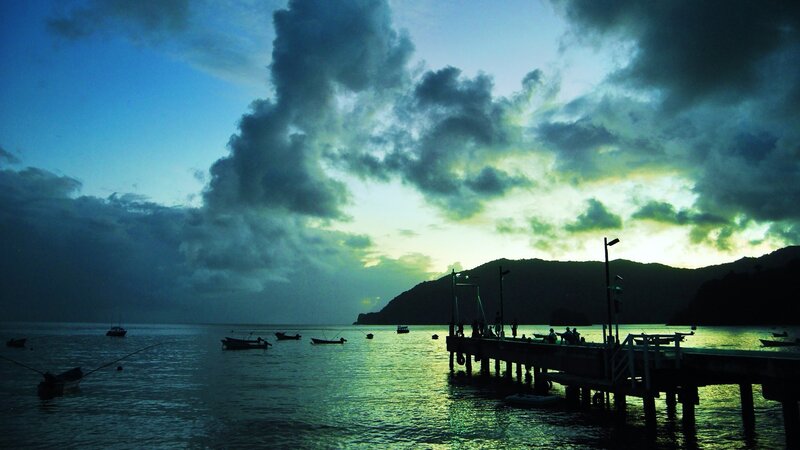 Silhouetted Boats at Dusk — Blue, Dramatic