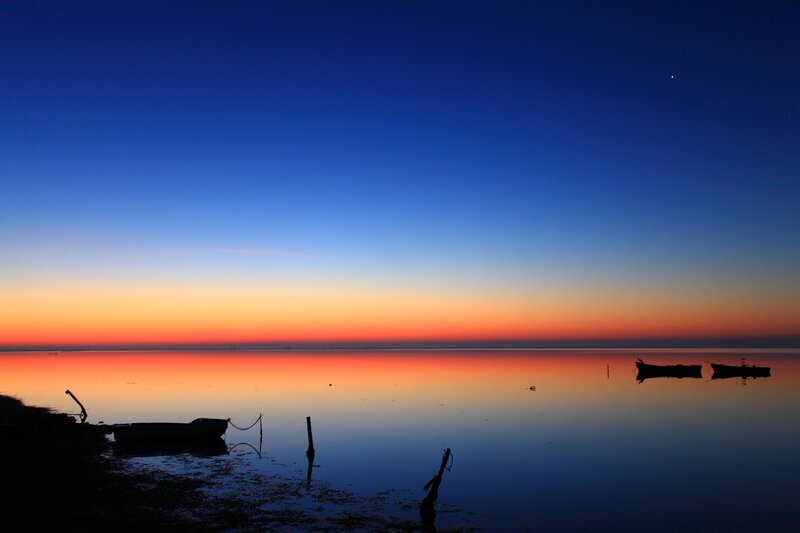 Silhouetted Boats at Dusk — Blue, Serene