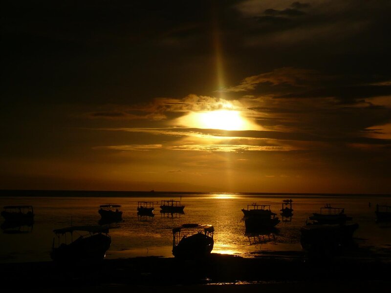 Silhouetted Boats at Sunset — Gold