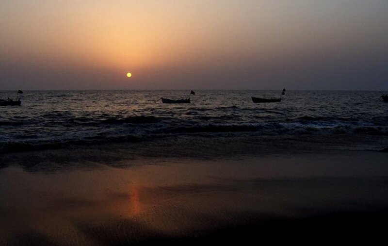 Silhouetted Boats at Sunset — Orange, Serene, Photograph, Ocean