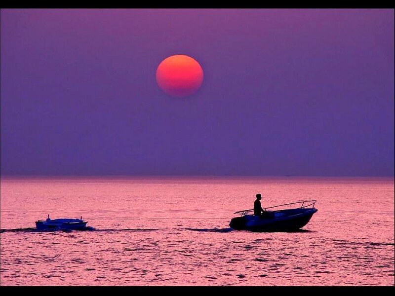 Silhouetted Boats at Sunset — Purple, Serene