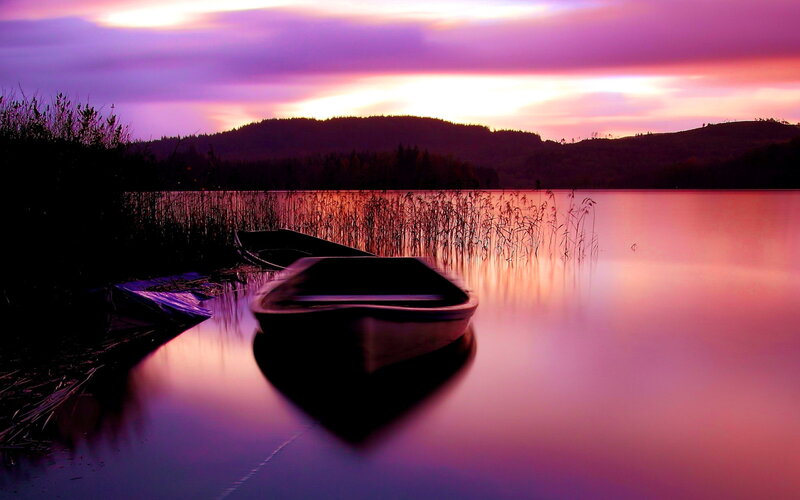 Silhouetted Boats on Lake — Purple