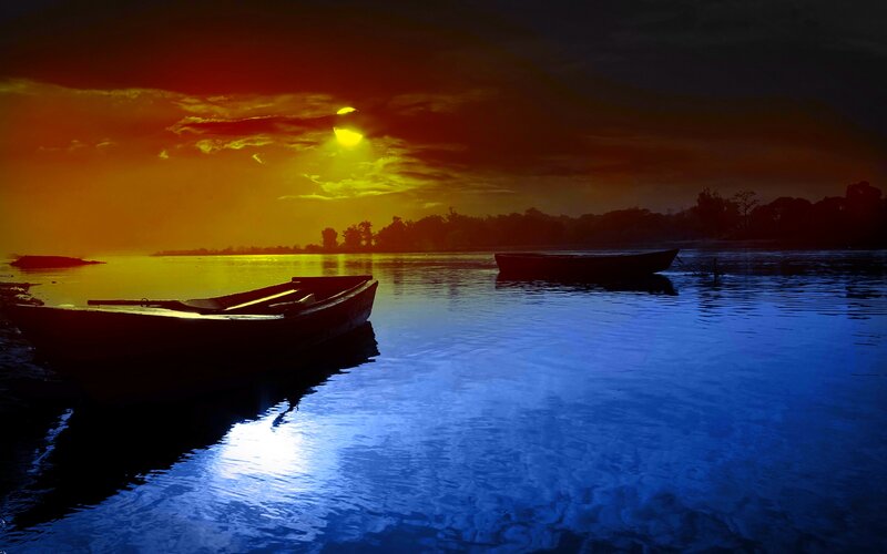 Silhouetted Boats on Water — Blue, Dramatic