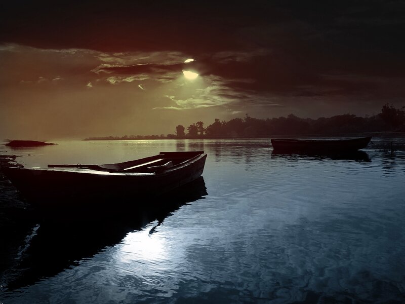 Silhouetted Boats on Water — Dark Blue