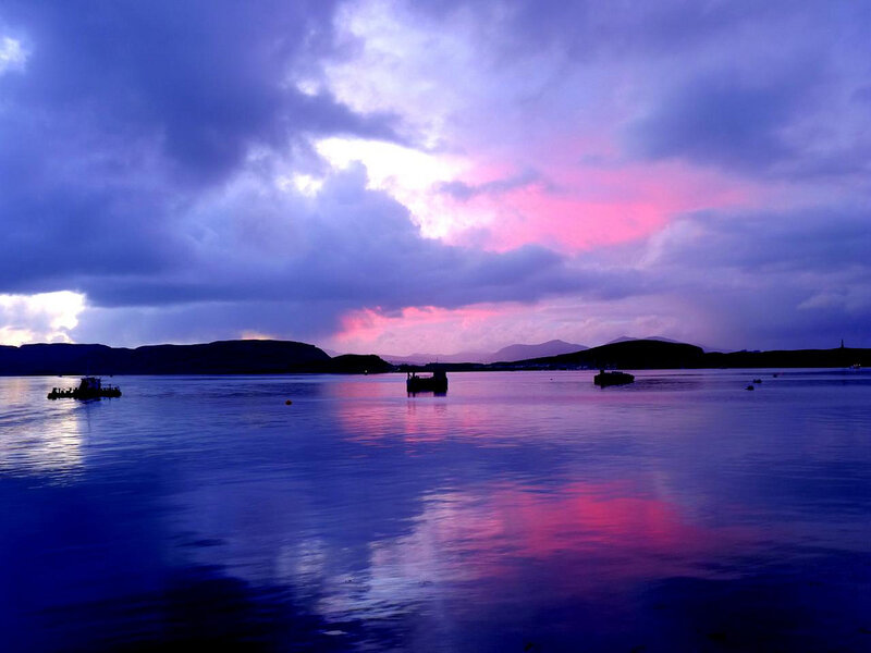 Silhouetted Boats on Water — Purple