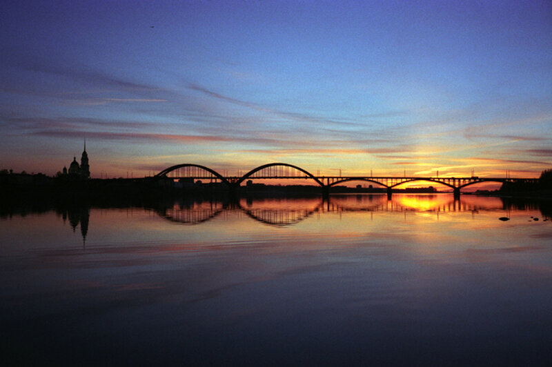 Silhouetted Bridge at Sunset — Blue
