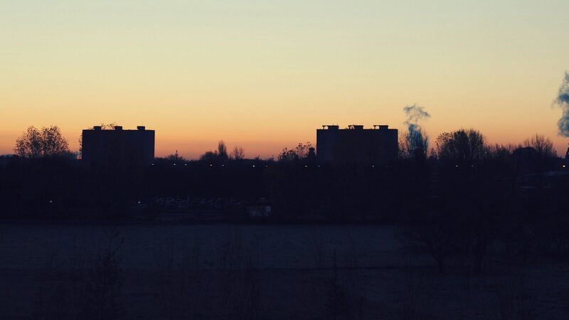 Silhouetted Buildings at Dusk — Orange, Calm