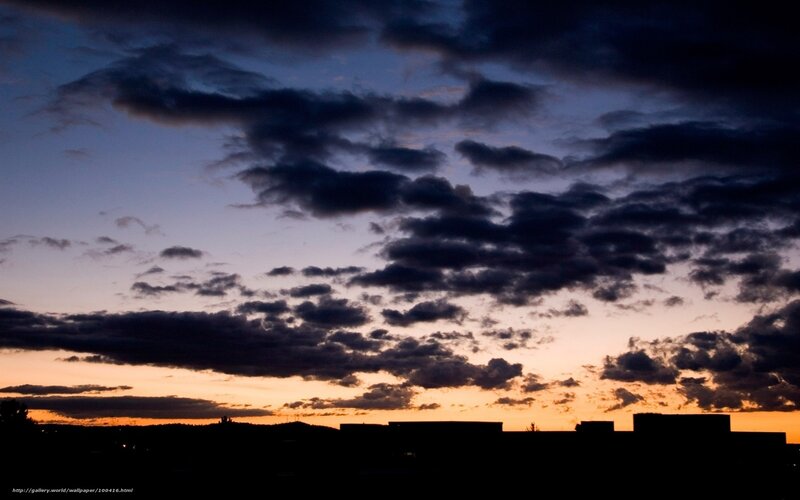 Silhouetted Buildings at Dusk — Orange