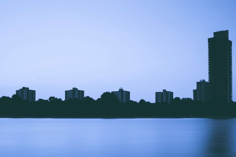 Silhouetted Buildings by Water