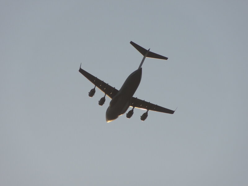 Silhouetted Cargo Plane