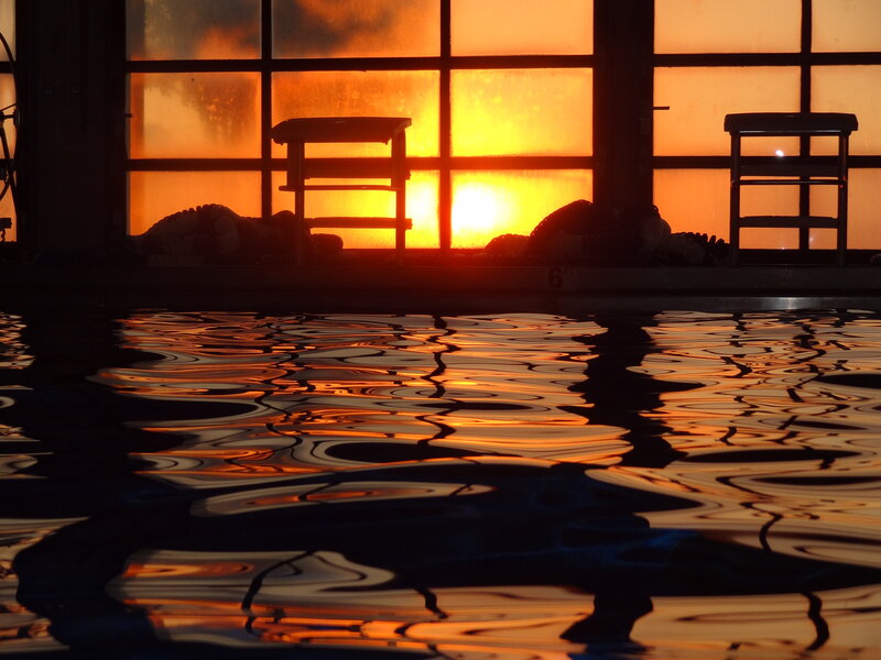 Silhouetted Chairs by Pool
