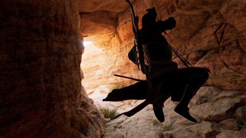 Silhouetted Character in Cave